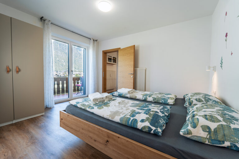 Schlafzimmer mit Balkon